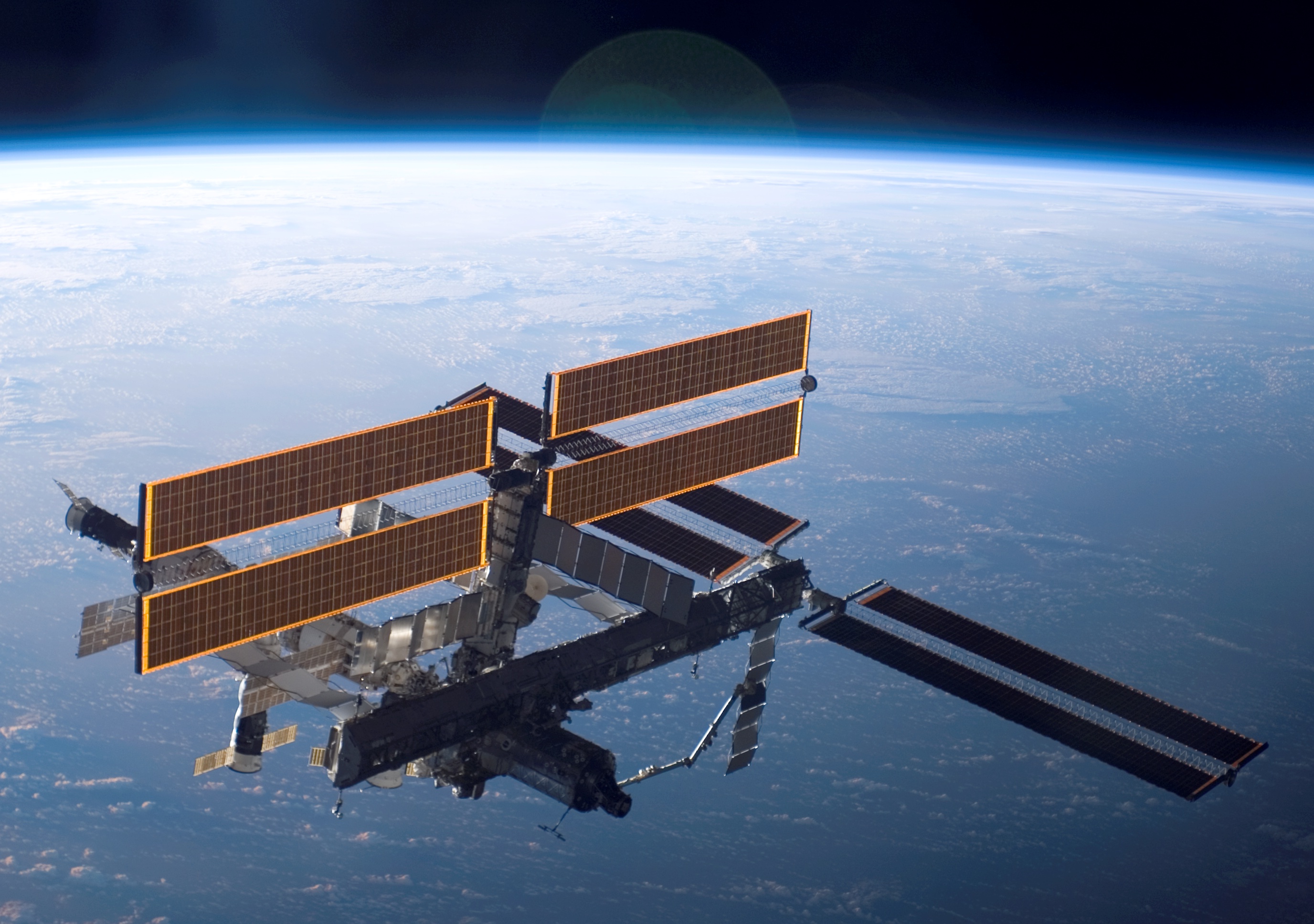 Atlantis left the station with a new, second pair of 240-foot solar wings, attached to a new 17.5-ton section of truss with batteries, electronics and a giant rotating joint. 